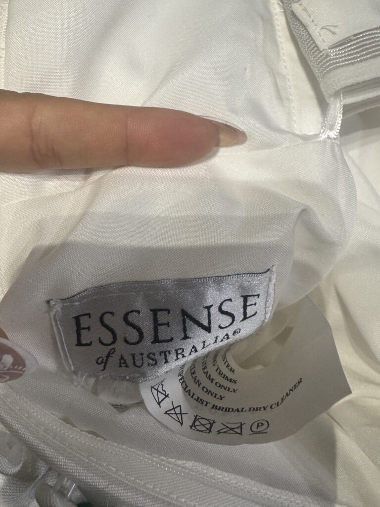 Essense of Australia wedding dress label inside ivory Mikado bridal gown
