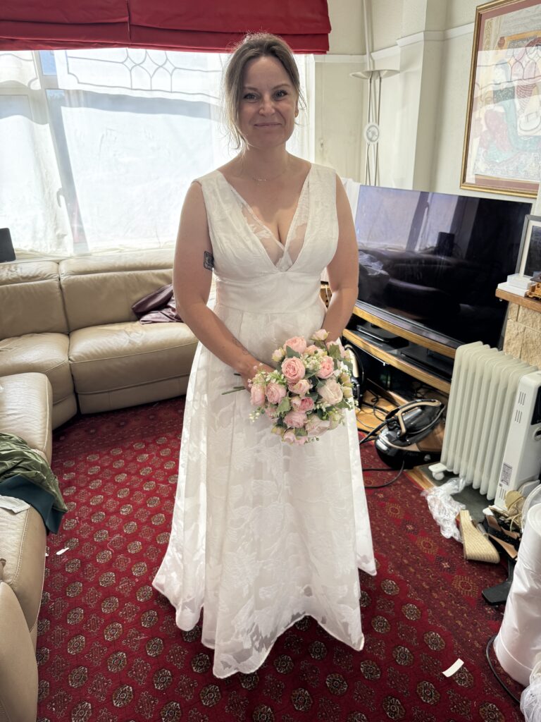 Bride from Norbury wearing her altered Coast wedding dress at Tailor-Alter’s Sutton studio.